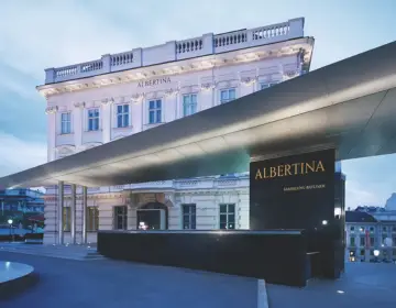 Albertina Museum entrance with a sleek black canopy.