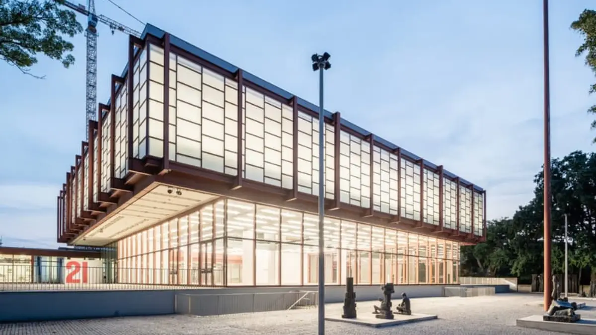 Belvedere 21 Museum in Vienna, a modern glass and steel building with large windows.