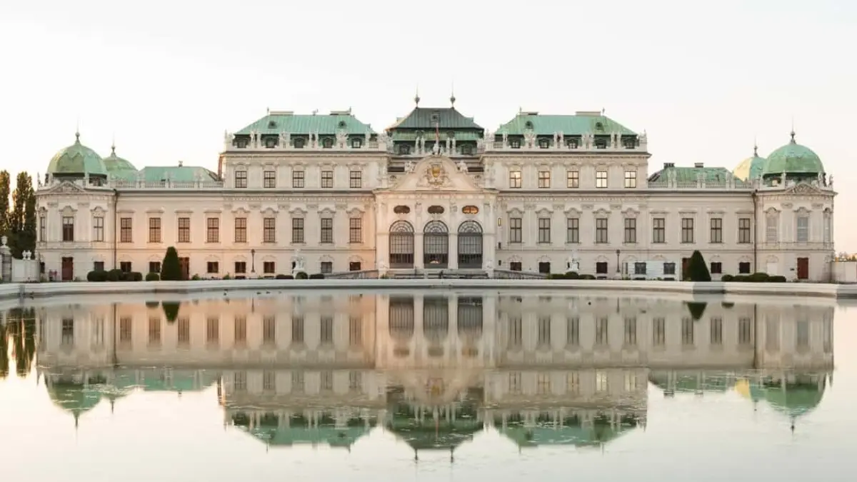 The view of Upper Belvedere Palace reflected in the water