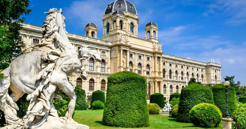 he grand façade of the Kunsthistorisches Museum in Vienna under a sunny sky. he grand façade of the Kunsthistorisches Museum in Vienna under a sunny sky.