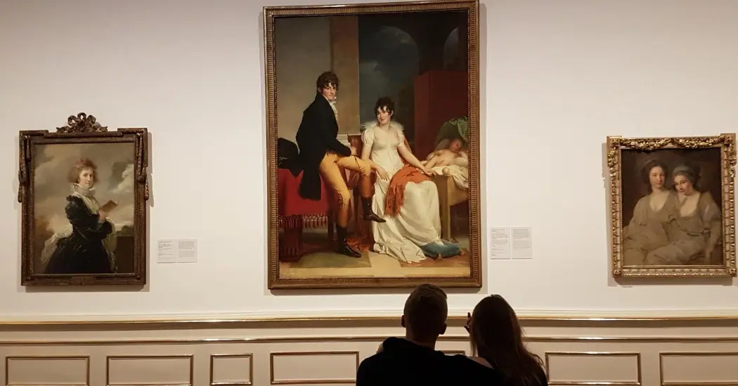 Couple admiring the famous artworks in the Upper Belvedere exhibition. Couple admiring the famous artworks in the Upper Belvedere exhibition.