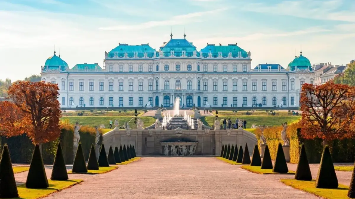 The Upper Belvedere Palace in Vienna with alpine Gardens and a cascading fountain in front. The Upper Belvedere Palace in Vienna with alpine Gardens and a cascading fountain in front.